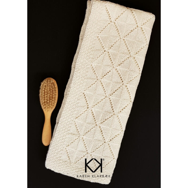 Opskrift på strikket Babytæppe i hulmønster - trykt opskrift